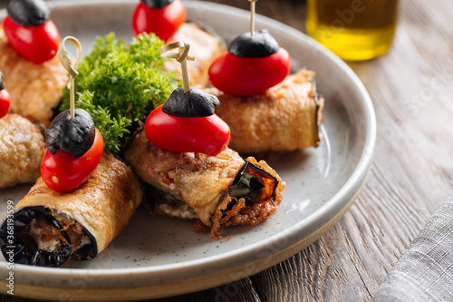 Canvas-taulu Closeup on eggplant rolls appetizer