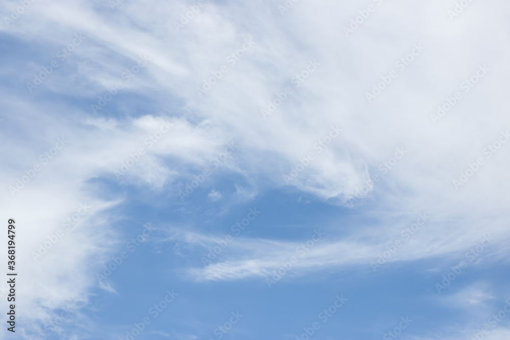 blue sky background with tiny clouds. blue sky background with tiny clouds.