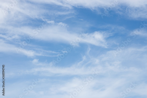 Fototapeta Naklejka Na Ścianę i Meble -  blue sky background with tiny clouds.