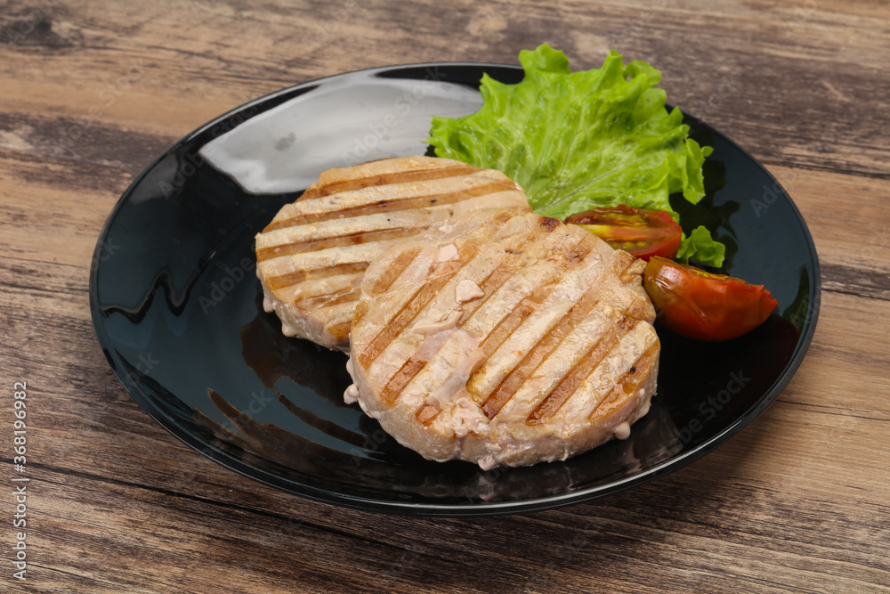 Grilled tuna steak with kumato Grilled tuna steak with kumato