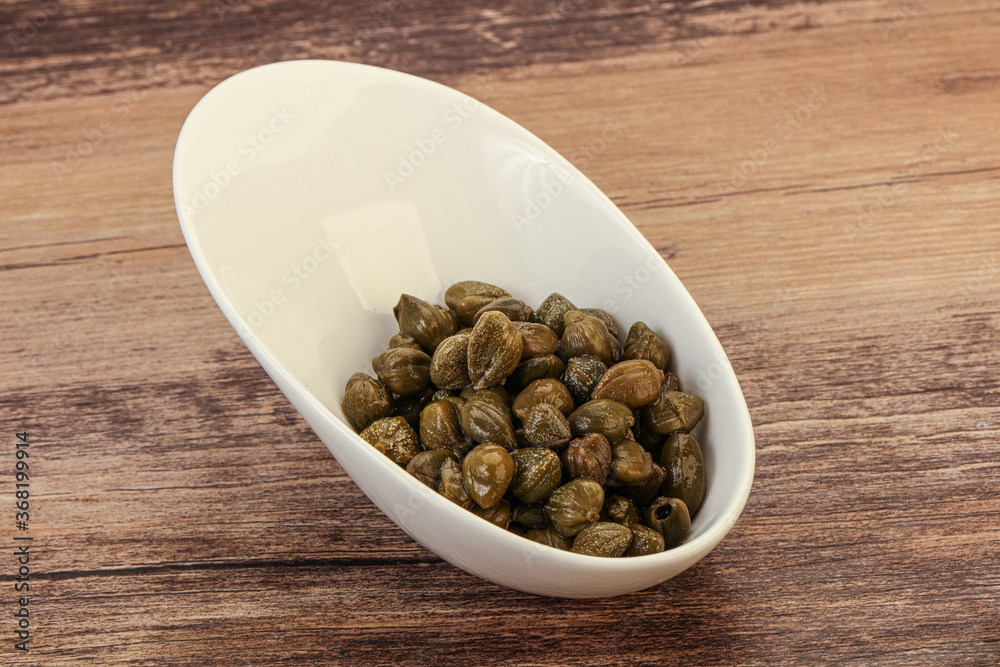 Tasty capers in the bowl Tasty capers in the bowl