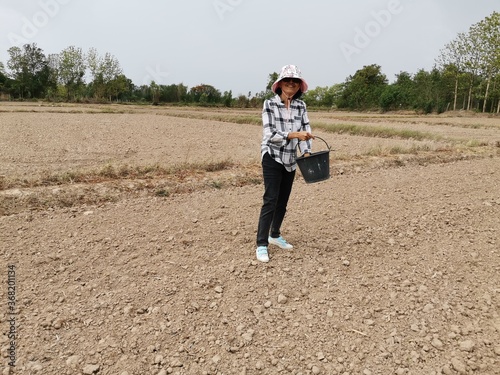 young woman working in the field.