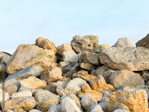 Large stones on the stone beach in the background