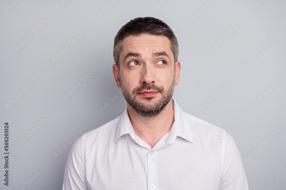 Close-up portrait of his he nice attractive content serious minded mature man executive manager wearing white shirt overthinking isolated over light gray pastel color background