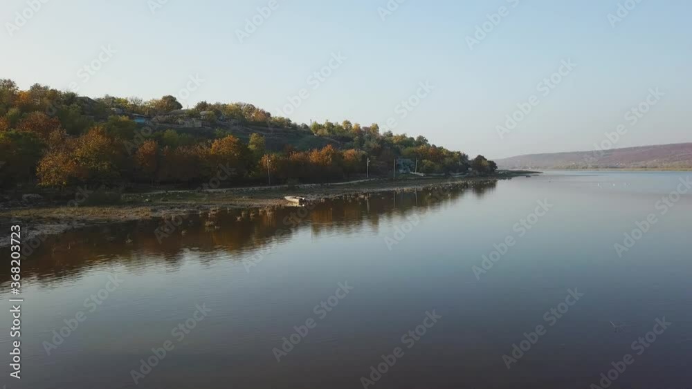 Sunset over the river in autumn. Aerial view. Sunset over the river in autumn. Aerial view.