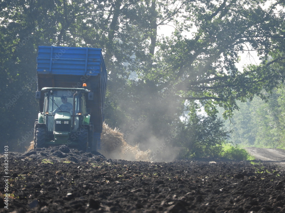Fototapeta premium tractor in the field
