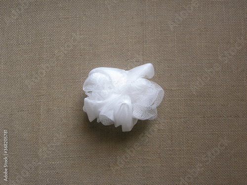 Fototapeta Naklejka Na Ścianę i Meble -  White color soft plastic bath Loofah