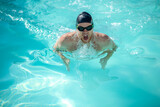 Swimmer with his head above water while breathing air