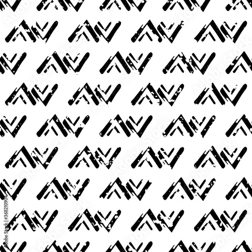 Vector loose tribal zig zag grunge seamless pattern background. Painterly brush stroke chevrons ethnic black and white backdrop. Geometric design. All over print for packaging, stationery.