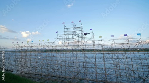 Wallpaper Mural NAKHON PHANOM, THAILAND - OCTOBER 13, 2019: Traditional fire boat floating in Mekong river in Nakhon Phanom, Thailand Torontodigital.ca