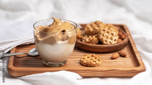  Coffee mousse, delicious biscuits and almonds.