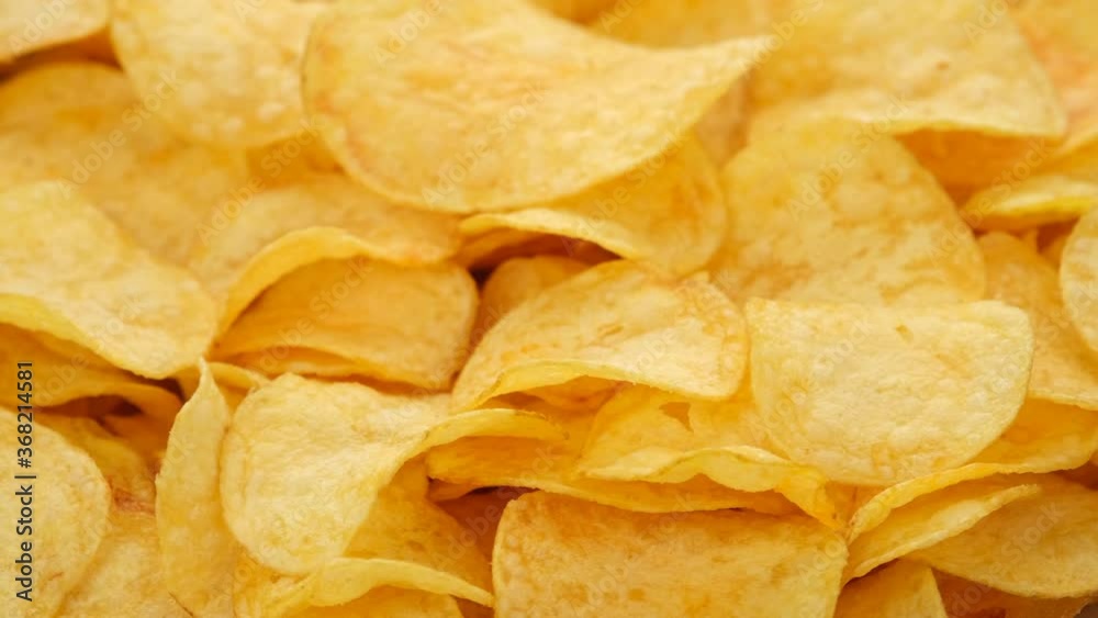 golden potato chips with cheddar cheese, rotating golden potato chips with cheddar cheese, rotating