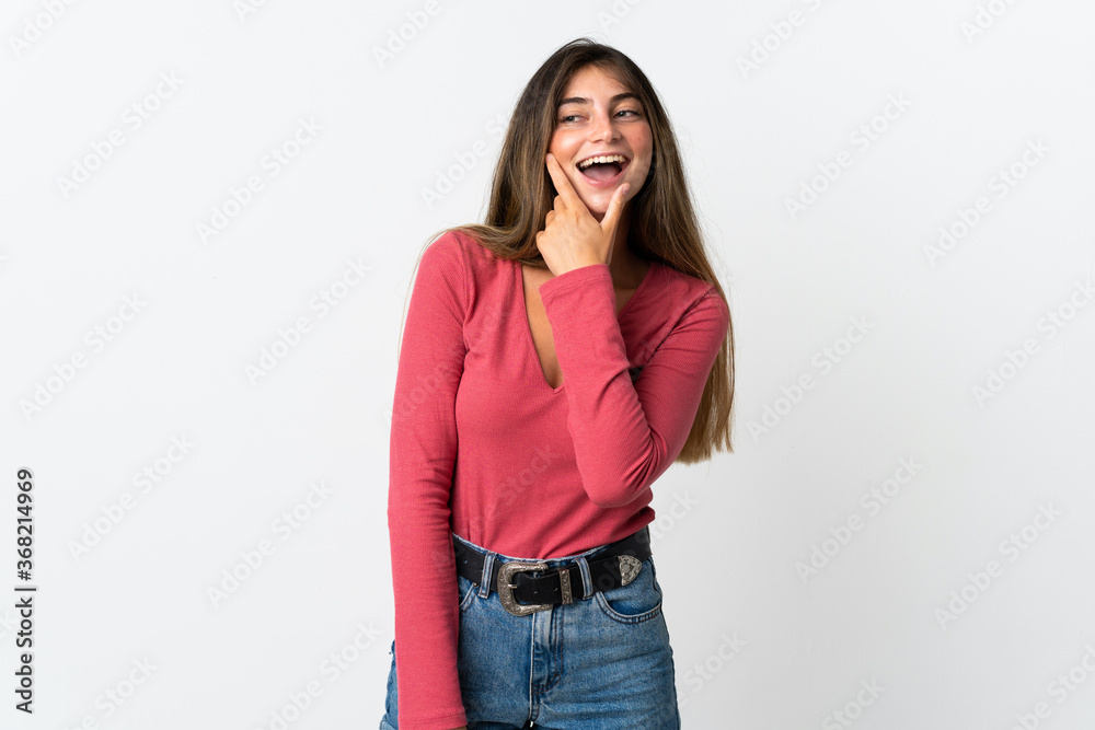 Fototapeta premium Young caucasian woman isolated on white background happy and smiling