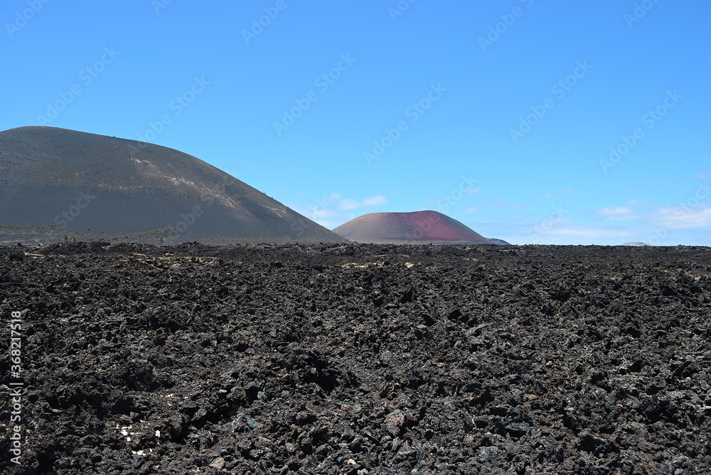 Lanzarote landscape, lava field and volcano at morning