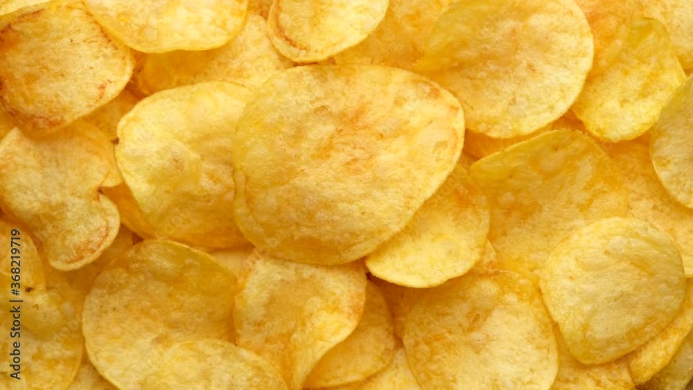 potato chips with cheddar cheese, rotating close up potato chips with cheddar cheese, rotating close up