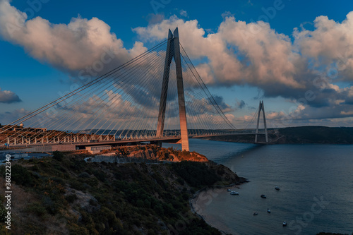 Bosphorus Yavuz Sultan Selim Bridge, blue sky and white clouds.