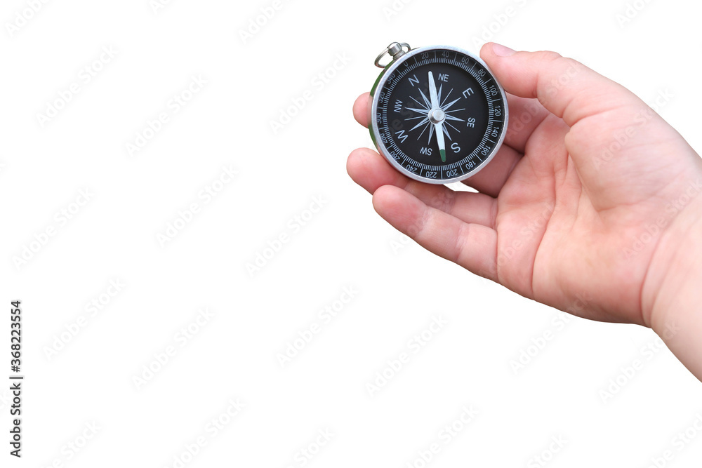 round compass in hand isolated on white background for abstract image with place for text as symbol of tourism with compass, travel with compass and outdoor activities with compass round compass in hand isolated on white background for abstract image with place for text as symbol of tourism with compass, travel with compass and outdoor activities with compass
