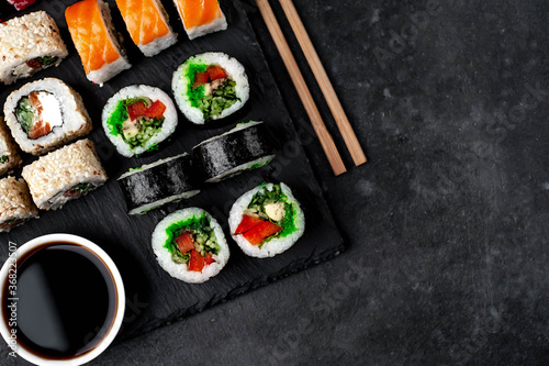 Set of sushi on a stone background with copy space for your text