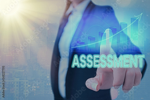 Text sign showing Assessment. Business photo showcasing action or an instance of making a judgment about something Arrow symbol going upward denoting points showing significant achievement photo