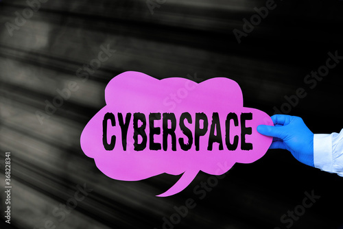 Handwriting text Cyberspace. Conceptual photo the online world of computer networks and especially the Internet Displaying Empty Sticker Paper Accessories Smartphone With Medical Gloves On photo