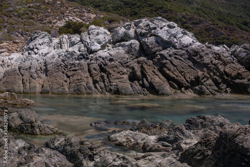 Long exposure of the sea and rocks on the coast of the Mediterranean Island of Corsica. Nonza.