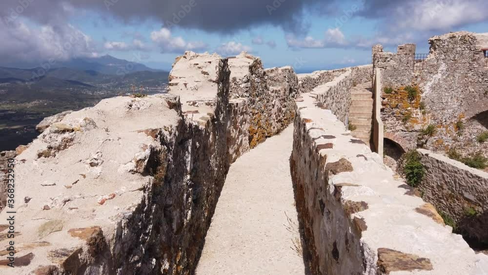 View of ruins from the city walls of Castello del Volterraio or Volterraio Castle, the oldest fortress on Elba Island, Tuscany, Italy between Portoferraio and Rio nell'Elba. View of ruins from the city walls of Castello del Volterraio or Volterraio Castle, the oldest fortress on Elba Island, Tuscany, Italy between Portoferraio and Rio nell'Elba.