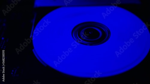 CD rom with blue rgb lights and a cd that inside turns photo