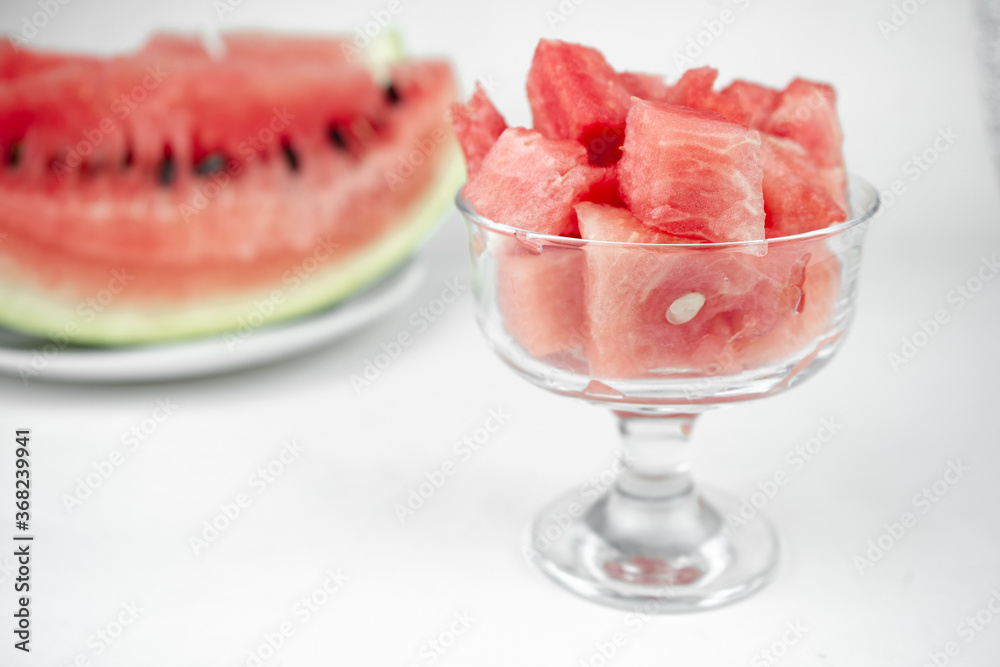 watermelon chopped pieces in a glass cup, summer fruit refreshment watermelon chopped pieces in a glass cup, summer fruit refreshment