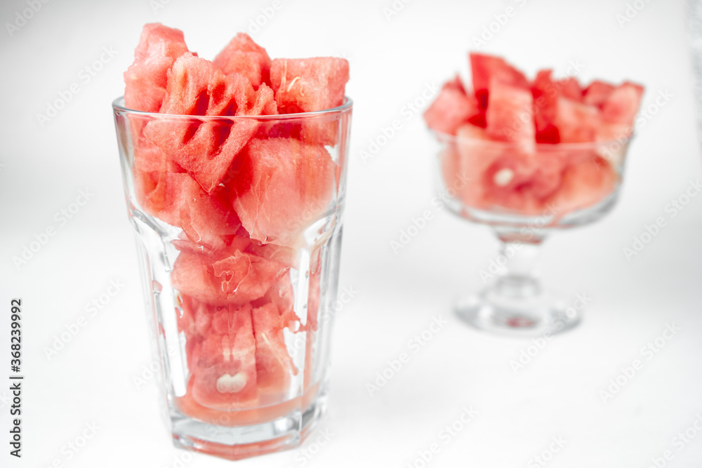 watermelon chopped pieces in a glass cup, summer fruit refreshment watermelon chopped pieces in a glass cup, summer fruit refreshment