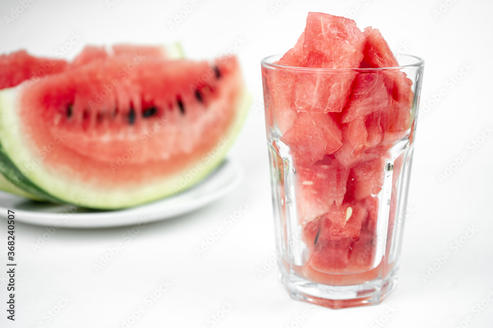 watermelon chopped pieces in a glass cup, summer fruit refreshment watermelon chopped pieces in a glass cup, summer fruit refreshment