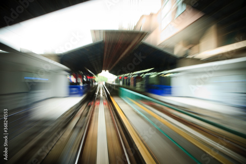 Motion blur photo of subway road, monorail, train station