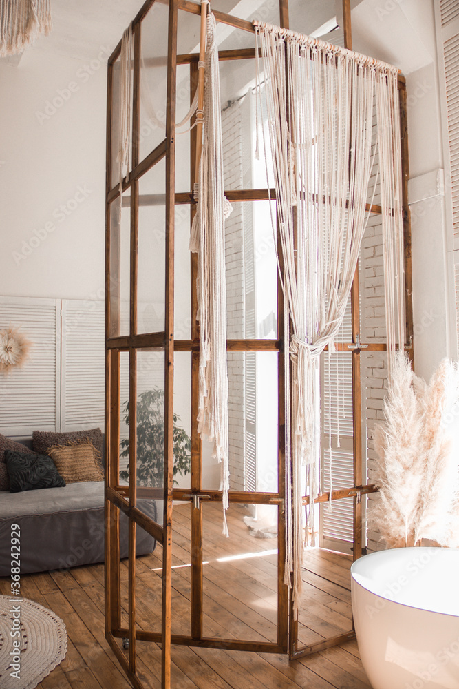 loft partitions in a wooden frame in a boho interior loft partitions in a wooden frame in a boho interior