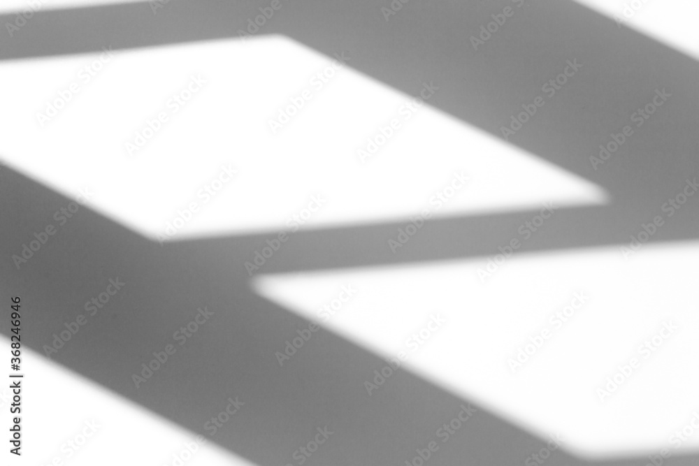 Shadow overlay effect for photo. Geometric shadow from a window or door on a white clean wall in clear weather. Geometric composition shadow Shadow overlay effect for photo. Geometric shadow from a window or door on a white clean wall in clear weather. Geometric composition shadow