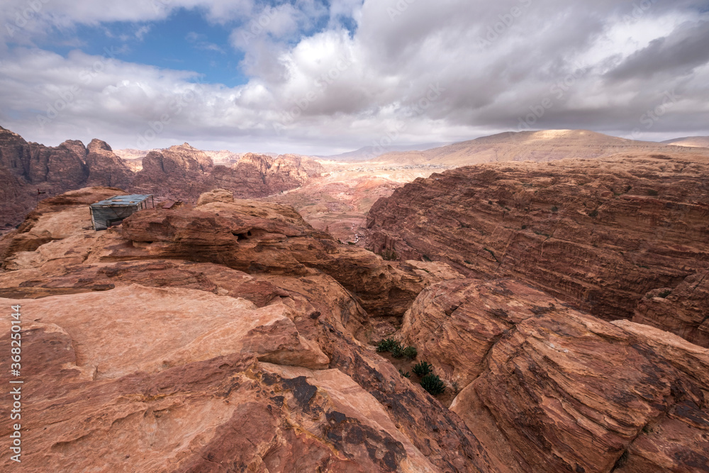 Deserted mountains in Jordan in the ancient city of Petra, view from the top to the valley.