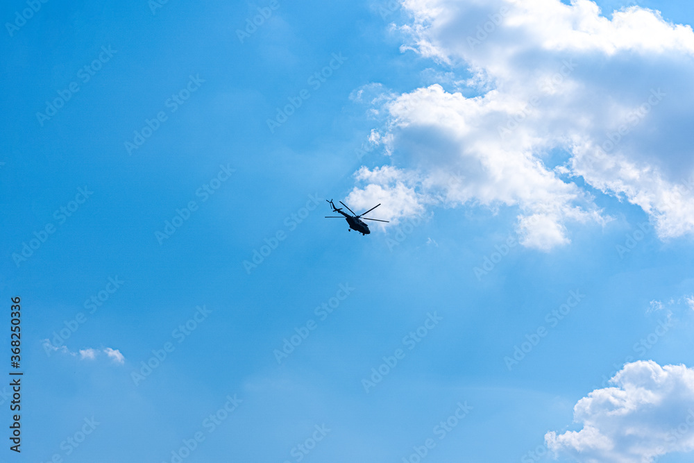 Helicopter flight across the sky Helicopter flight across the sky