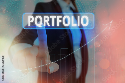 Obraz na płótnie Text sign showing Portfolio. Business photo showcasing securities held by an investor, paper held by a financial house Arrow symbol going upward denoting points showing significant achievement w salonie