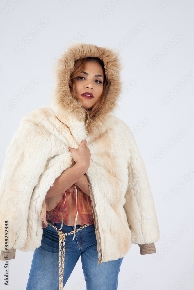 Pretty woman with a fur coat with a hood Pretty woman with a fur coat with a hood