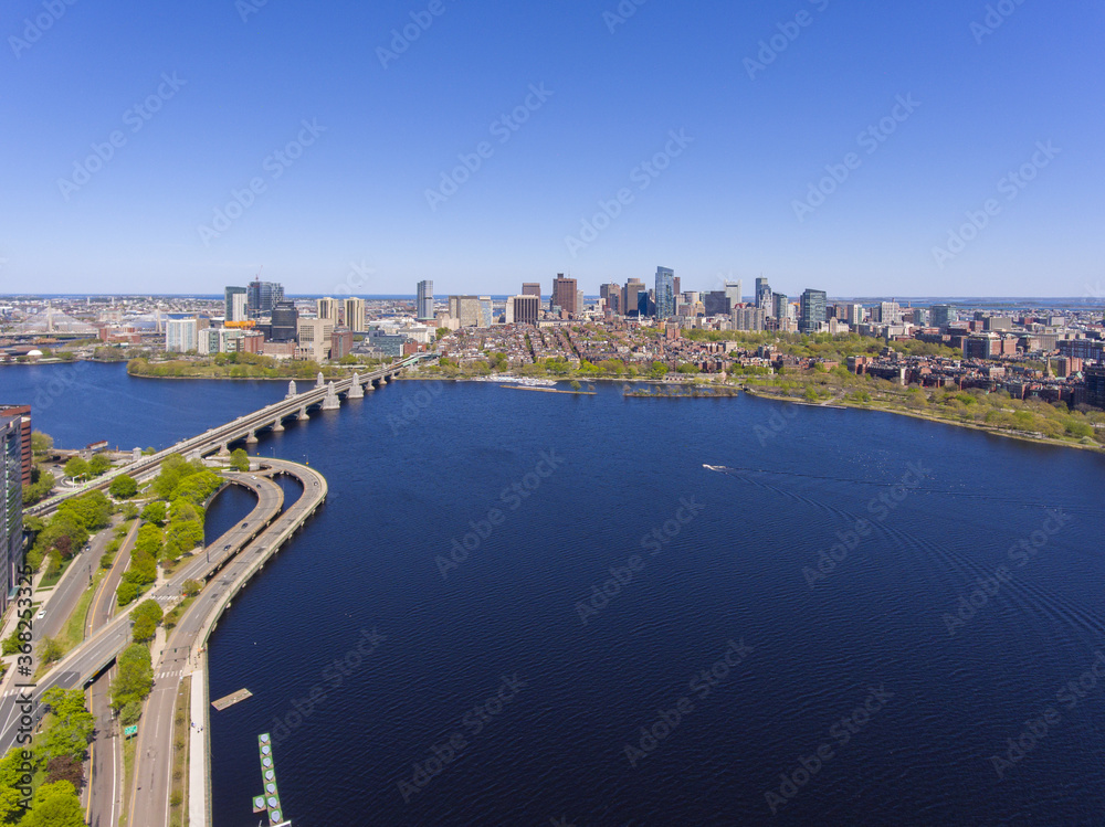 Aerial view of Cambridge on the left and Boston on the right connected by Longfellow Bridge from Charles River, Cambridge, Massachusetts MA, USA. 