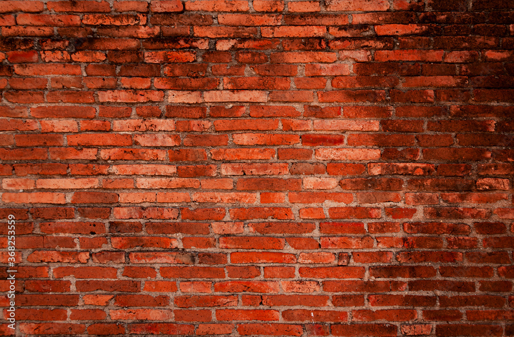 Naklejka premium Red brick wall texture for background