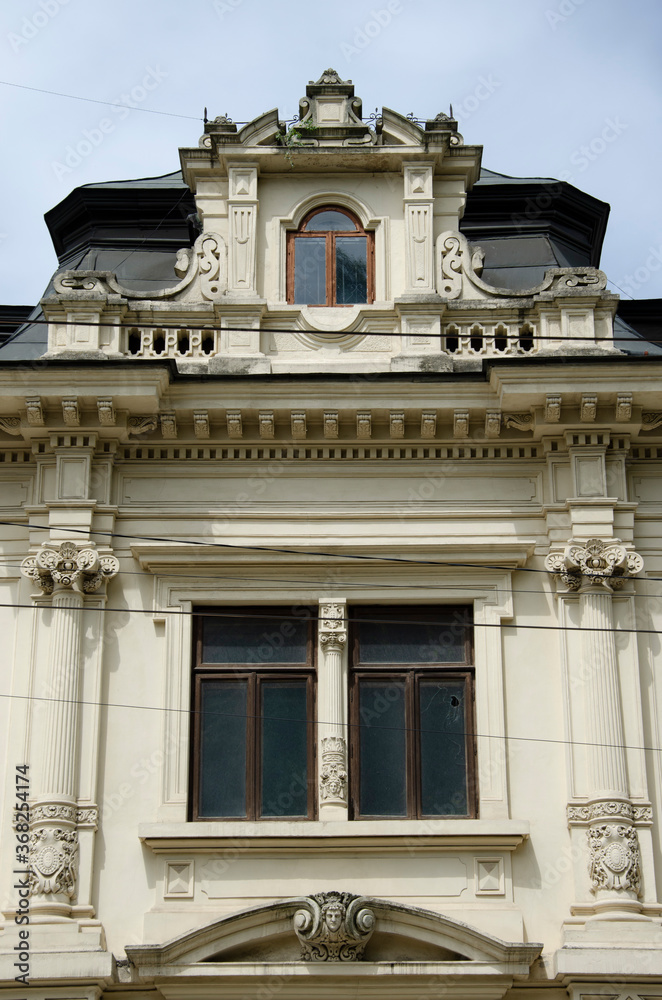 Decorative ornamental part of building facade in the city center. Lviv, Ukraine