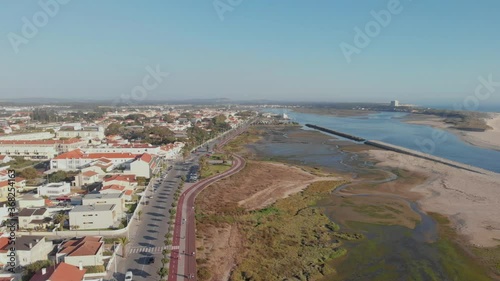 Wallpaper Mural DRONE AERIAL FOOTAGE - Palm trees promenade and cycle path, Esposende, The marginal riverside, along the mouth of the Cavado River in Esposende, Portugal. Torontodigital.ca