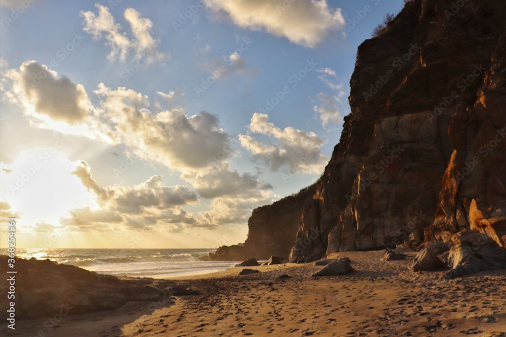 golden sunset light on cliffs with special rock formation golden sunset light on cliffs with special rock formation