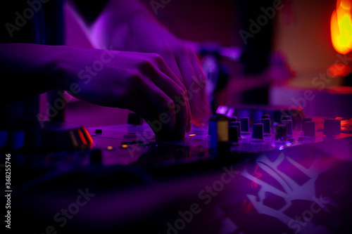 dj mixing music at night