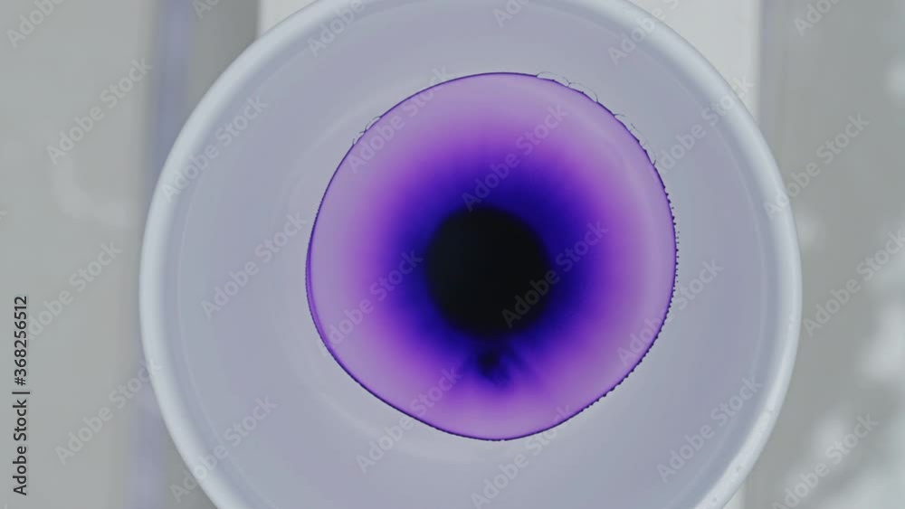 Purple color reaction with liquid ink drop / oil bloom / Big Bang supernova Purple color reaction with liquid ink drop / oil bloom / Big Bang supernova