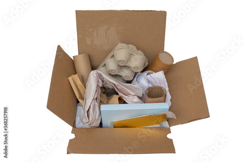 Sorting waste home. Cardboard, paper in cardboard box on white background. Ecology, separate garbage collection, the concept of pollution. Eco-friendly single-use packaging, waste recycling concept