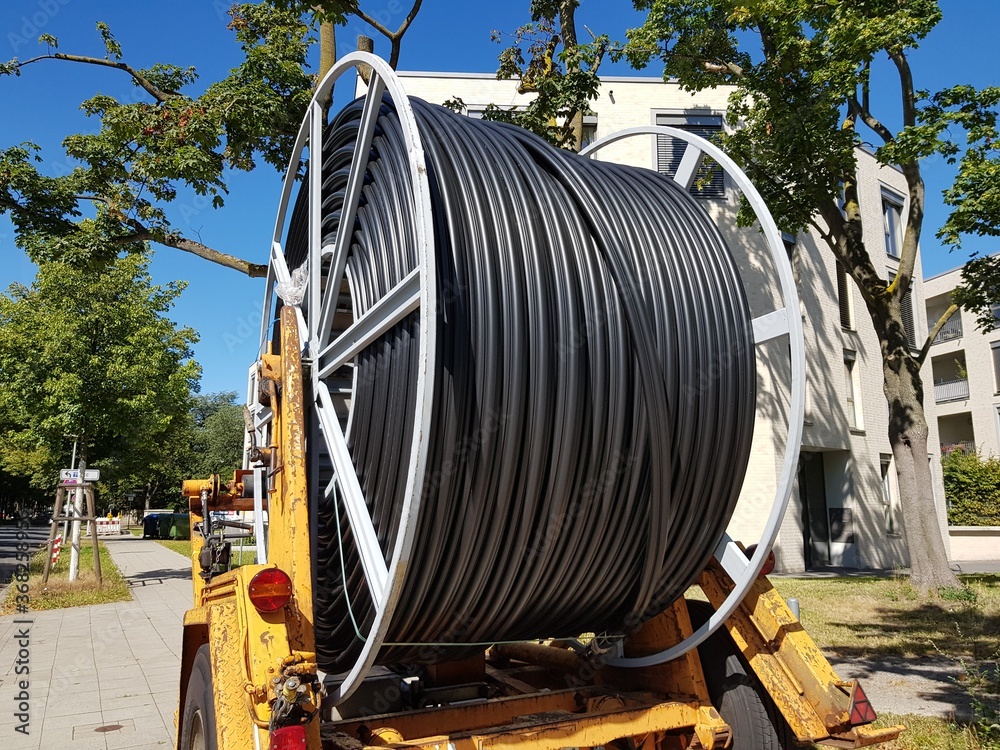 Laying of fiber optic cable in Hanover, Germany. Glass fibers are