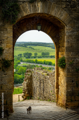 Old arch entrance in Montereggioni Italy