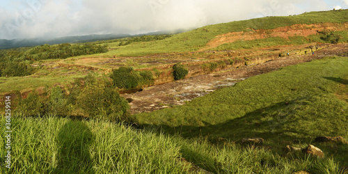 Dainthlen Falls And A Large Green Valley On The Mountain of Sohra or Cherrapunji In Meghalaya In India photo