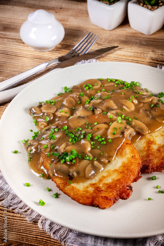Crispy potato pancakes with mushroom sauce Crispy potato pancakes with mushroom sauce