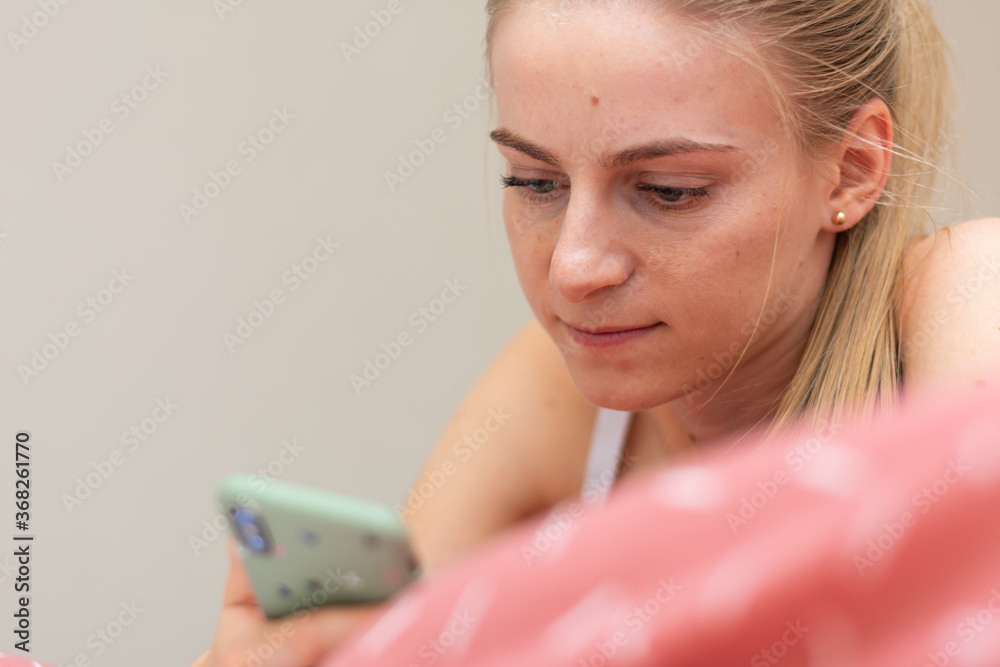 Young woman relaxing on couch. Happy female rest on sofa. Young woman relaxing on couch. Happy female rest on sofa.